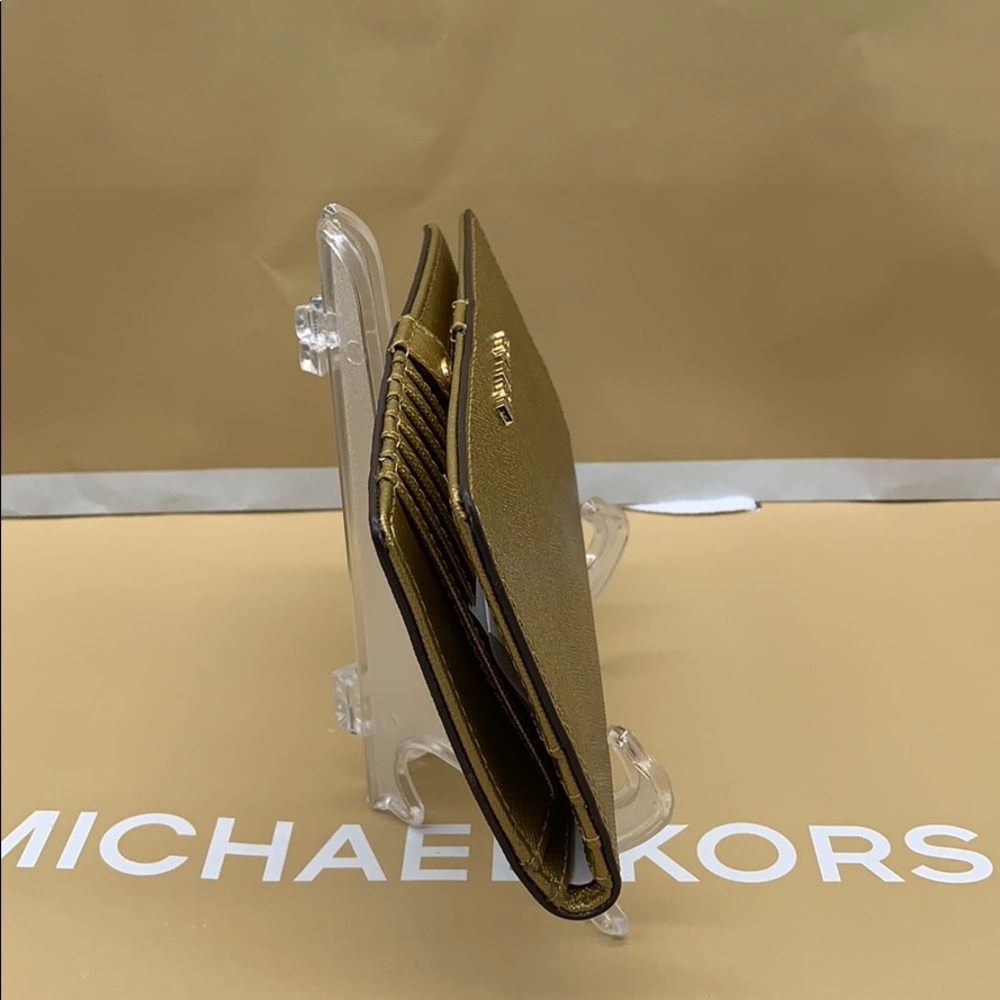 Michael Kors Jet Set Travel Md Flt Slm Bfl… - Picture 9 of 16